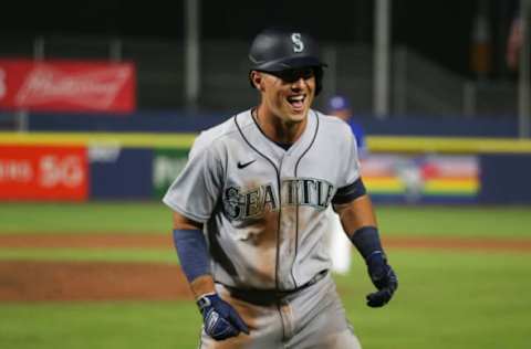 BUFFALO, NEW YORK – JUNE 30: Dylan Moore #25 of the Seattle Mariners celebrates after his three-run home run. (Photo by Joshua Bessex/Getty Images)