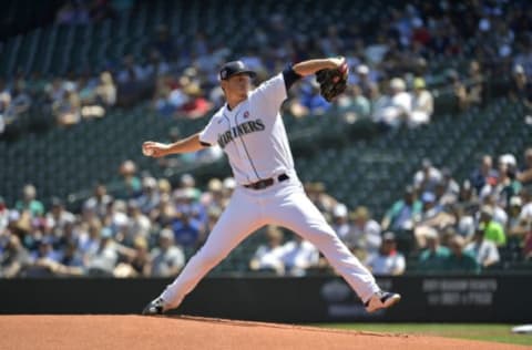 SEATTLE, WASHINGTON – JULY 04: Chris Flexen #77 of the Seattle Mariners throws a pitch during the first inning of the game against the Texas Rangers. (Photo by Alika Jenner/Getty Images)