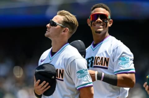 DENVER, CO – JULY 11: Jarred Kelenic #14 and Julio Rodriguez #3 of American League Futures Team and Seattle Mariners look on. (Photo by Dustin Bradford/Getty Images)