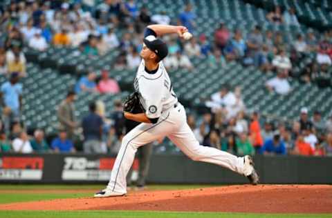 SEATTLE, WASHINGTON – JULY 27: Chris Flexen #77 of the Seattle Mariners throws a pitch during the first inning of the game against the Houston Astros at T-Mobile Park on July 27, 2021 in Seattle, Washington. (Photo by Alika Jenner/Getty Images)