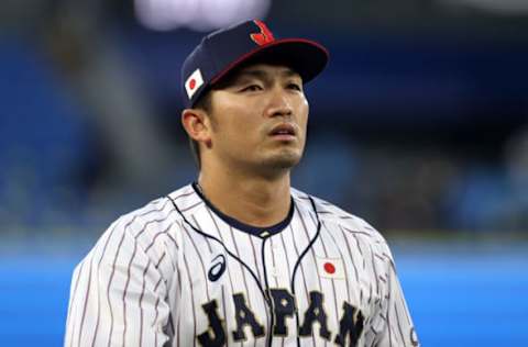 YOKOHAMA, JAPAN – AUGUST 04: Seiya Suzuki #51 of Team Japan looks on before the game against Team Republic of Korea during the semifinals of men’s baseball on day twelve of the Tokyo 2020 Olympic Games at Yokohama Baseball Stadium on August 04, 2021 in Yokohama, Japan. (Photo by Koji Watanabe/Getty Images)