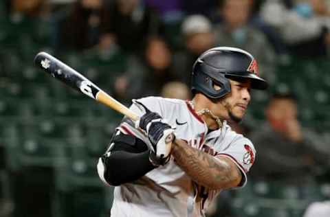 SEATTLE, WASHINGTON – SEPTEMBER 10: Ketel Marte #4 of the Arizona Diamondbacks at bat against the Seattle Mariners at T-Mobile Park on September 10, 2021 in Seattle, Washington. (Photo by Steph Chambers/Getty Images)