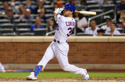 NEW YORK, NY – SEPTEMBER 12: Michael Conforto #30 of the New York Mets in action against the New York Yankees during a game at Citi Field on September 12, 2021 in New York City. (Photo by Rich Schultz/Getty Images)