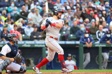 SEATTLE, WASHINGTON – SEPTEMBER 15: Kyle Schwarber #18 of the Boston Red Sox hits a two-run single against the Seattle Mariners during the tenth inning at T-Mobile Park on September 15, 2021 in Seattle, Washington. (Photo by Abbie Parr/Getty Images)