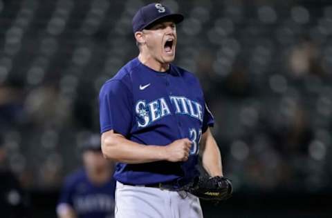 OAKLAND, CALIFORNIA – SEPTEMBER 21: Pitcher Paul Sewald #37 of the Seattle Mariners reacts after striking out Matt Chapman #26 of the Oakland Athletics to end the eighth inning at RingCentral Coliseum on September 21, 2021 in Oakland, California. The Mariners won the game 5-2. (Photo by Thearon W. Henderson/Getty Images)