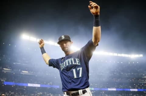 SEATTLE, WASHINGTON – OCTOBER 02: Mitch Haniger #17 of the Seattle Mariners reacts after beating the Los Angeles Angels 6-4 at T-Mobile Park on October 02, 2021 in Seattle, Washington. (Photo by Steph Chambers/Getty Images)