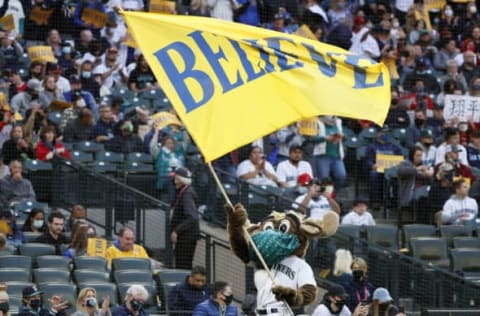 SEATTLE, WASHINGTON – OCTOBER 02: The Mariner Moose waves a flag that reads “believe” before the game between the Seattle Mariners and the Los Angeles Angels at T-Mobile Park on October 02, 2021 in Seattle, Washington. (Photo by Steph Chambers/Getty Images)