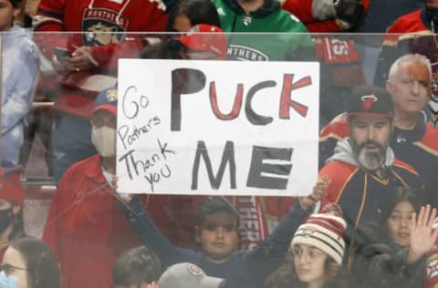 SUNRISE, FL – JANUARY 29: xA young fan holds up a sign hoping one of the Florida Panthers will give him a puck prior to the game against the San Jose Sharks at the FLA Live Arena on January 29, 2022 in Sunrise, Florida. (Photo by Joel Auerbach/Getty Images)