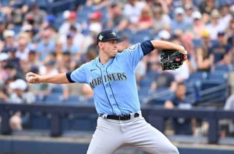 PHOENIX, ARIZONA – MARCH 26: Chris Flexen #77 of the Seattle Mariners delivers a pitch against the Milwaukee Brewers during a spring training game at American Family Fields of Phoenix on March 26, 2022 in Phoenix, Arizona. (Photo by Norm Hall/Getty Images)