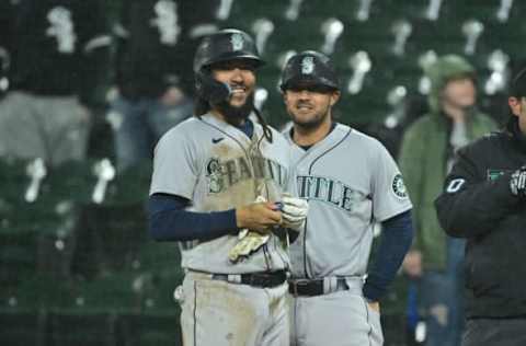 CHICAGO, ILLINOIS – APRIL 13: J.P. Crawford #3 of the Seattle Mariners reacts at first base after his RBI single in the ninth inning against the Chicago White Sox at Guaranteed Rate Field on April 13, 2022 in Chicago, Illinois. (Photo by Quinn Harris/Getty Images)