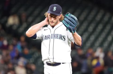 SEATTLE, WASHINGTON – APRIL 21: Drew Steckenrider #16 of the Seattle Mariners reacts after giving up an RBI single to Nathaniel Lowe #30 of the Texas Rangers during the ninth inning at T-Mobile Park on April 21, 2022 in Seattle, Washington. (Photo by Abbie Parr/Getty Images)