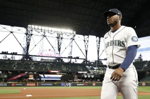 SEATTLE, WASHINGTON – MAY 24: Kyle Lewis #1 of the Seattle Mariners makes his way to the dugout before the game against the Oakland Athletics at T-Mobile Park on May 24, 2022 in Seattle, Washington. (Photo by Steph Chambers/Getty Images)