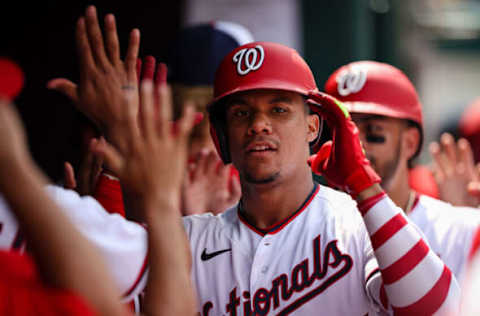 WASHINGTON, DC – JULY 13: Juan Soto #22 of the Washington Nationals celebrates with teammates after hitting a three run home run against the Seattle Mariners during the ninth inning of game one of a doubleheader at Nationals Park on July 13, 2022 in Washington, DC. (Photo by Scott Taetsch/Getty Images)