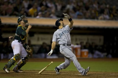 OAKLAND, CA – AUGUST 19: Raul Ibanez #28 of the Seattle Mariners hits an infield pop fly for an out against the Oakland Athletics during the seventh inning at O.co Coliseum on August 19, 2013 in Oakland, California. The Oakland Athletics defeated the Seattle Mariners 2-1. (Photo by Jason O. Watson/Getty Images)