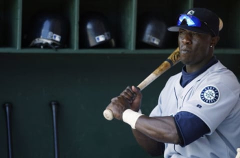 OAKLAND, CA – APRIL 3: Mike Cameron #44 of the Seattle Mariners sits in the dugout during the game against the Oakland Athletics at the Network Associates Coliseum on April 3, 2003 in Oakland, California. The Mariners defeated the A’s 7-6 in 11 innings. (Photo by Jed Jacobsohn/Getty Images)