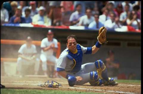 24 APR 1991: SEATTLE MARINERS CATCHER DAVE VALLE MAKES A PLAY DURING THE MARINERS VERSUS CALIFORNIA ANGELS GAME AT ANAHEIM STADIUM IN ANAHEIM, CALIFORNIA. MANDATORY CREDIT: STEPHEN DUNN/ALLSPORT USA