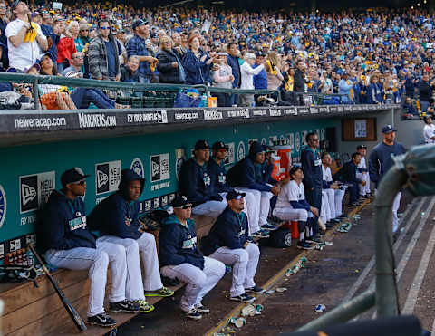 SEATTLE, WA – SEPTEMBER 28: Fans give a round of applause as the score of the Texas vs Oakland game is posted on the scoreboard elininating the Seattle Mariners from post season play during the game against the Los Angeles Angels of Anaheim at Safeco Field on September 28, 2014 in Seattle, Washington. (Photo by Otto Greule Jr/Getty Images)