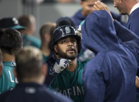 SEATTLE, WA – MAY 27: Franklin Gutierrez #21 of the Seattle Mariners is congratulated by teammates in the dugout after hitting a solo home run during the first inning of a game against the Minnesota Twins at Safeco Field on May 27, 2016 in Seattle, Washington. (Photo by Stephen Brashear/Getty Images)