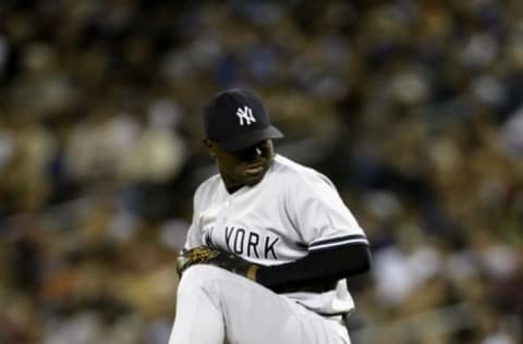 SEATTLE – AUGUST 29: Pitcher Tom Gordon #36 of the New York Yankees delivers a pitch against the Seattle Mariners during the game on August 29, 2005 at Safeco Field in Seattle, Washington. The Yankees won 7-4. (Photo by Otto Greule Jr/Getty Images)