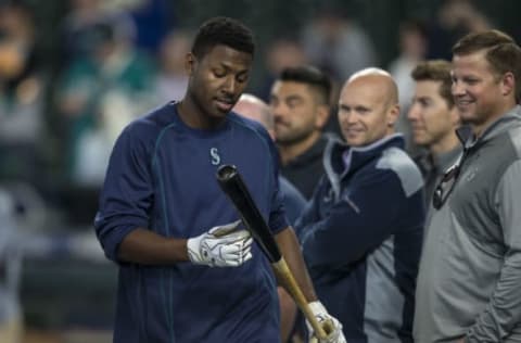 SEATTLE, WA – JUNE 11: Seattle Mariners 2016 first round draft pick Kyle Lewis walks past scouts during batting practice before a game between the Texas Rangers and the Seattle Mariners at Safeco Field on June 11, 2016 in Seattle, Washington. The Rangers won the game 2-1 in eleven innings. (Photo by Stephen Brashear/Getty Images)