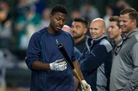 SEATTLE, WA – JUNE 11: Seattle Mariners 2016 first round draft pick Kyle Lewis walks past scouts during batting practice before a game between the Texas Rangers and the Seattle Mariners at Safeco Field on June 11, 2016 in Seattle, Washington. The Rangers won the game 2-1 in eleven innings. (Photo by Stephen Brashear/Getty Images)