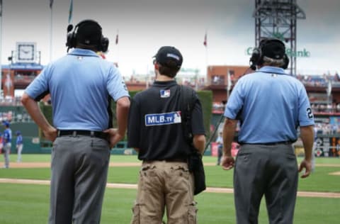 PHILADELPHIA, PA – JULY 3: Umpires review a call with the assistance of an MLB.TV technician in the fourth inning during a game between the Philadelphia Phillies and Kansas City Royals at Citizens Bank Park on July 3, 2016 in Philadelphia, Pennsylvania. The Phillies won 7-2. (Photo by Hunter Martin/Getty Images) *** Local Caption ***