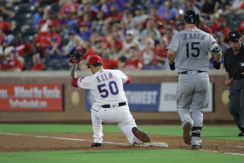 ARLINGTON, TX – AUGUST 29: Keone Kela #50 of the Texas Rangers makes the out against Kyle Seager #15 of the Seattle Mariners in the eighth inning at Globe Life Park in Arlington on August 29, 2016 in Arlington, Texas. (Photo by Ronald Martinez/Getty Images)