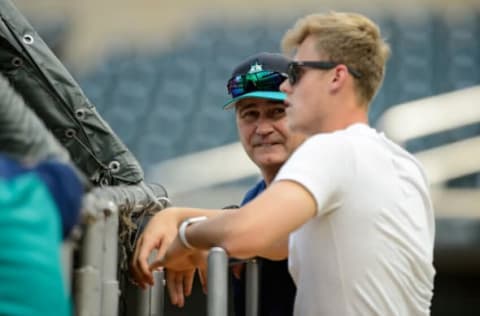 MINNEAPOLIS, MN – JUNE 13: Sam Carlson of Burnsville High School and second round draft pick by the Seattle Mariners watches batting practice with manager Scott Servais #9 of the Seattle Mariners before the game against the Minnesota Twins on June 13, 2017 at Target Field in Minneapolis, Minnesota. The Twins defeated the Mariners 20-7. (Photo by Hannah Foslien/Getty Images)