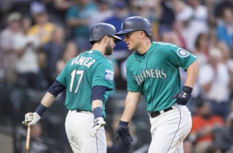 SEATTLE, WA – JUNE 23: Kyle Seager #15 of the Seattle Mariners is congratulated by Mitch Haniger #17 of the Seattle Mariners after hitting a solo home run off of starting pitcher Joe Musgrove #59 of the Houston Astros during the fourth inning of a game at Safeco Field on June 23, 2017 in Seattle, Washington. (Photo by Stephen Brashear/Getty Images)