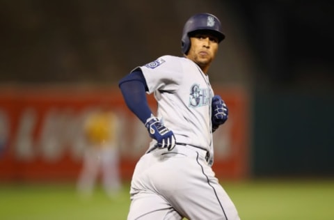 OAKLAND, CA – AUGUST 08: Leonys Martin #12 of the Seattle Mariners looks back over his shoulder after he hit a home run in the 10th inning against the Oakland Athletics at Oakland Alameda Coliseum on August 8, 2017, in Oakland, California. (Photo by Ezra Shaw/Getty Images)