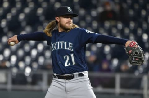 KANSAS CITY, MO – APRIL 9: Taylor Motter #21 of the Seattle Mariners throws in the eighth inning against the Kansas City Royals at Kauffman Stadium on April 9, 2018 in Kansas City, Missouri. (Photo by Ed Zurga/Getty Images)