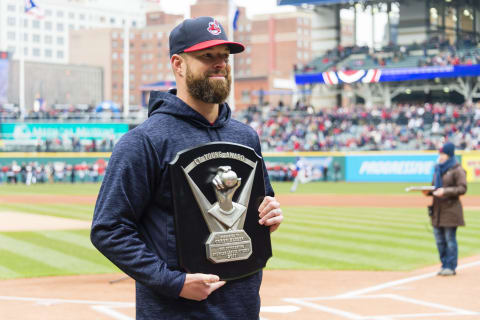 CLEVELAND, OH – APRIL 6: Corey Kluber of the Cleveland Indians receives his 2017 Cy Young award prior to a game. Kluber is a potential Mariners target. (Photo by Jason Miller/Getty Images)