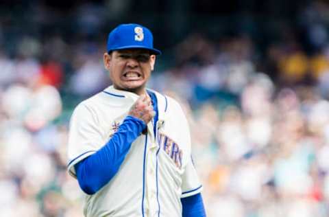 SEATTLE, WA – MAY 06: Felix Hernandez #34 of the Seattle Mariners reacts after Chris Young #24 of the Los Angeles Angels of Anaheim was hit by a foul off of his foot in the sixth inning at Safeco Field on May 6, 2018, in Seattle, Washington. (Photo by Lindsey Wasson/Getty Images)