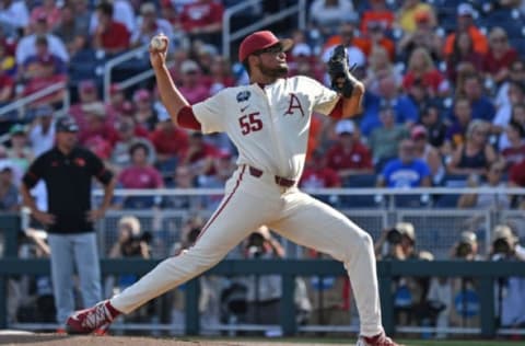 Omaha, NE – JUNE 28: Pitcher Isaiah Campbell #55 of the Arkansas Razorbacks delivers a pitch. He is now a member of the Seattle Mariners organization. (Photo by Peter Aiken/Getty Images)