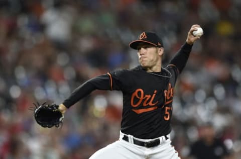 BALTIMORE, MD – JUNE 29: Paul Fry #51 of the Baltimore Orioles pitches in the eighth inning against the Los Angeles Angels of Anaheim during his MLB debut at Oriole Park at Camden Yards on June 29, 2018 in Baltimore, Maryland. (Photo by Patrick McDermott/Getty Images)