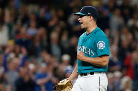 SEATTLE, WA – JUNE 29: Pitcher Marco Gonzales #32 of the Seattle Mariners celebrates the final out of his first complete game against the Kansas City Royals at Safeco Field on June 29, 2018 in Seattle, Washington. The Seattle Mariners beat the Kansas City Royals 4-1. (Photo by Lindsey Wasson/Getty Images)