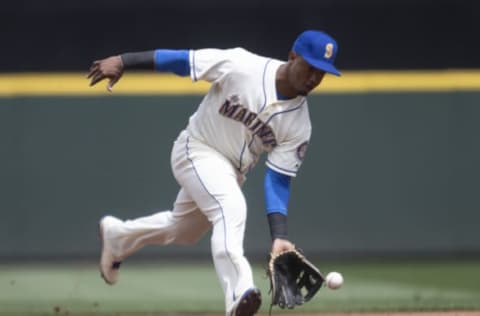 SEATTLE, WA – JULY 8: Shortstop Jean Segura #2 of the Seattle Mariners fields a ground ball hit by Ian Desmond #20 of the Colorado Rockies before throwing first base for an out during the second inning of a game at Safeco Field on July 8, 2018 in Seattle, Washington. (Photo by Stephen Brashear/Getty Images)