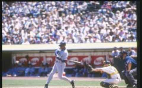 15 Jul 1997: Center fielder Ken Griffey Jr. of the Seattle Mariners swings at the ball during a game against the Oakland Athletics at the Oakland Coliseum.