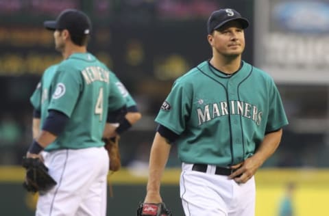 SEATTLE – JULY 29: Starting pitcher Erik Bedard #45 of the Seattle Mariners heads off the mound after being removed from the game in the second inning by manager Eric Wedge against the Tampa Bay Rays at Safeco Field on July 29, 2011 in Seattle, Washington. (Photo by Otto Greule Jr/Getty Images)