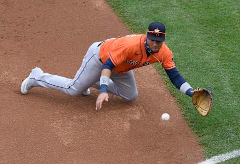 MINNEAPOLIS, MINNESOTA – SEPTEMBER 29: Yuli Gurriel #10 of the Houston Astros fields the ball hit by Jorge Polanco #11 of the Minnesota Twins during the second inning of Game One in the Wild Card Round at Target Field on September 29, 2020, in Minneapolis, Minnesota. (Photo by Hannah Foslien/Getty Images)