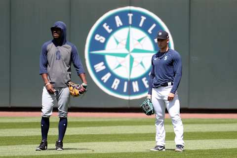 SEATTLE, WASHINGTON – JULY 12: Kyle Lewis #1 (L) and Jarred Kelenic #58 of the Seattle Mariners look on prior to an intrasquad game during summer workouts at T-Mobile Park on July 12, 2020 in Seattle, Washington. (Photo by Abbie Parr/Getty Images)