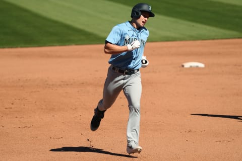 SEATTLE, WASHINGTON – JULY 13: Jarred Kelenic of the Seattle Mariners laps the bases after hitting a home run in an intrasquad game. (Photo by Abbie Parr/Getty Images)