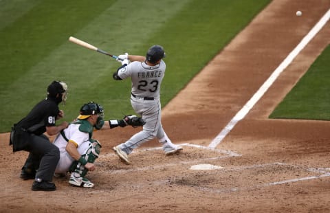 OAKLAND, CALIFORNIA – SEPTEMBER 26: Ty France of the Seattle Mariners hits a double against the Oakland Athletics. (Photo by Ezra Shaw/Getty Images)