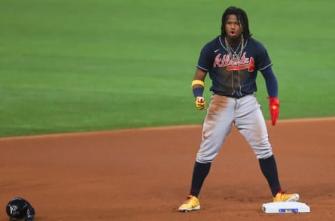 ARLINGTON, TEXAS – OCTOBER 18: Ronald Acuna Jr. of the Atlanta Braves reacts after stealing second base. (Photo by Ronald Martinez/Getty Images)