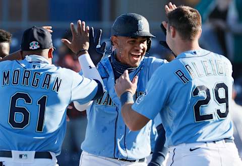 Julio Rodriguez of the Seattle Mariners after hitting a walk-off single in the ninth inning to defeat the San Diego Padres during spring training. (Photo by Steph Chambers/Getty Images)