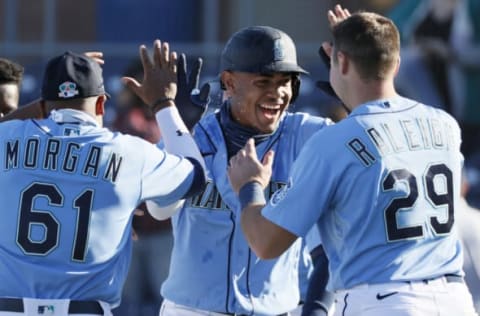 PEORIA, ARIZONA – FEBRUARY 28: Julio Rodríguez #85 of the Seattle Mariners reacts after hitting a walk-off single in the ninth inning to defeat the San Diego Padres 5-4 during the MLB spring training game at Peoria Sports Complex on February 28, 2021 in Peoria, Arizona. (Photo by Steph Chambers/Getty Images)