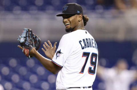 MIAMI, FLORIDA – AUGUST 25: Edward Cabrera #79 of the Miami Marlins reacts to a double play during the sixth inning against the Washington Nationals at loanDepot park on August 25, 2021 in Miami, Florida. (Photo by Michael Reaves/Getty Images)