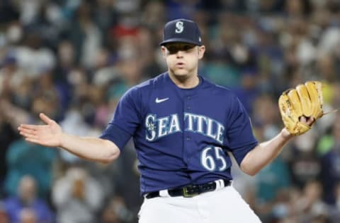 SEATTLE, WASHINGTON – OCTOBER 02: Casey Sadler #65 of the Seattle Mariners reacts during the game against the Los Angeles Angels at T-Mobile Park on October 02, 2021 in Seattle, Washington. (Photo by Steph Chambers/Getty Images)