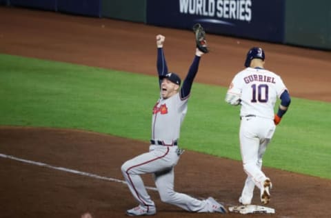 HOUSTON, TEXAS – NOVEMBER 02: Freddie Freeman #5 of the Atlanta Braves celebrates as he records the final out against Yuli Gurriel #10 to secure the team’s 7-0 victory against the Houston Astros in Game Six to win the 2021 World Series at Minute Maid Park on November 02, 2021 in Houston, Texas. (Photo by Bob Levey/Getty Images)