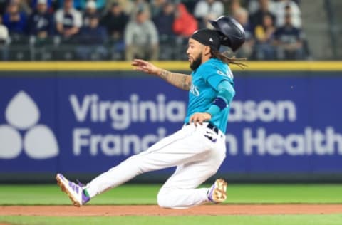 SEATTLE, WASHINGTON – JUNE 10: J.P. Crawford #3 of the Seattle Mariners slides to steal second base against the Boston Red Sox during the second inning at T-Mobile Park on June 10, 2022 in Seattle, Washington. (Photo by Abbie Parr/Getty Images)